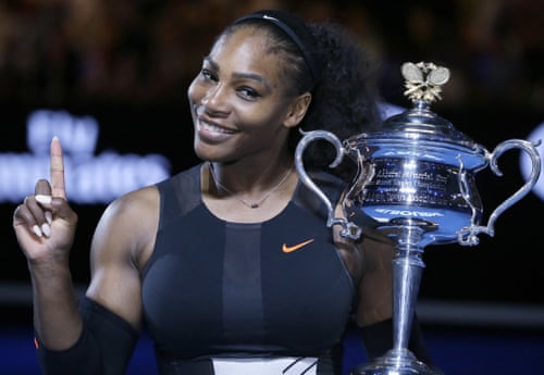 Serena Williams celebrates with the Australian Open trophy