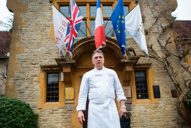 Blanc outside his restaurant