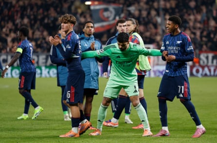 David Raya shoves forward Dowman and Andre Harriman-Annous to receive their acclaim at the end of the game