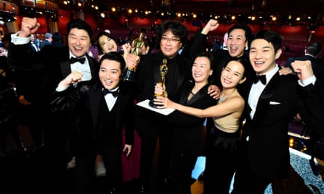 The Parasite team celebrate their Oscar wins backstage.