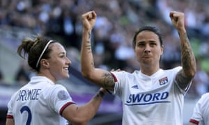 Dzsenifer Marozsán and Lucy Bronze celebrate Lyon’s victory in the Champions League final.