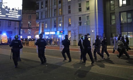 Riot police in Bristol on Sunday.