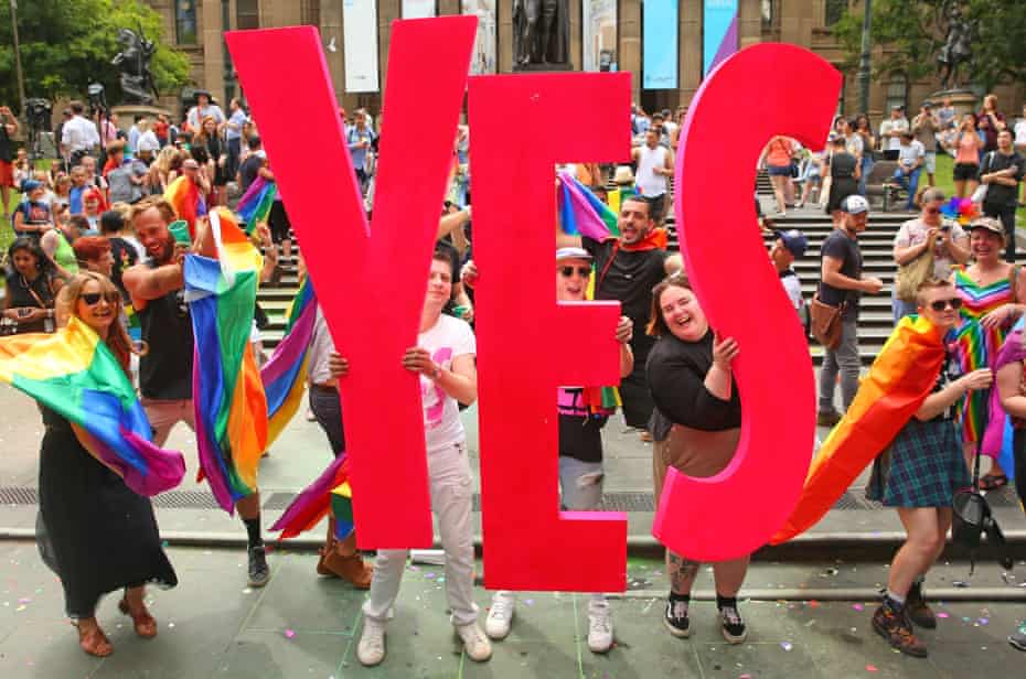 Marriage equality advocates in Melbourne celebrate as the result of the postal survey is announced.