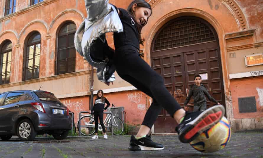 Children playing football in Rome