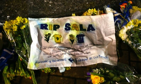 Tributes to Emiliano Sala are left outside the Cardiff City Stadium on Tuesday night.