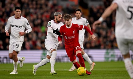 Harvey Elliott of Liverpool runs with the ball during the Carabao Cup Quarter Final match between Liverpool and West Ham United.