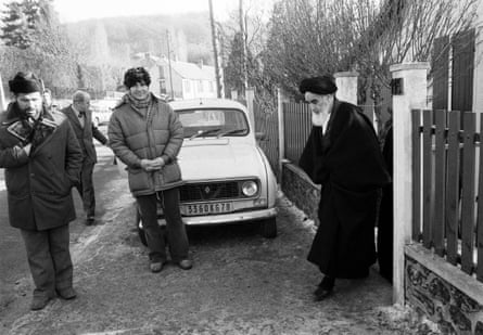 Ayatollah Ruhollah Khomeini leaves his home in Neauphle-le-Château, France, on 16 January 1979.