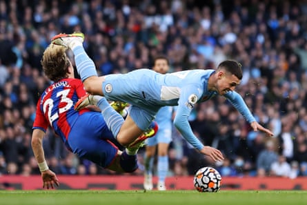 Conor Gallagher of Crystal Palace collides with Phil Foden of Manchester City during a game that Palace won 2-0.