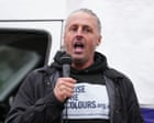 Leader of group behind flag campaign in England charged with 14 offences