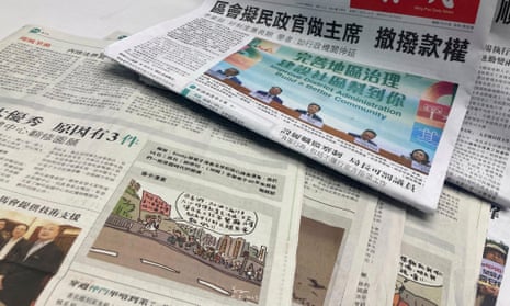 The front page of the Ming Pao News and a cartoon by cartoonist Zunzi