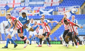 Birmingham’s Jeremie Bela heads home the only goal of the game.