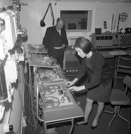 Delia Derbyshire, with Desmond Briscoe behind, at the BBC Radiophonic Workshop in 1965.