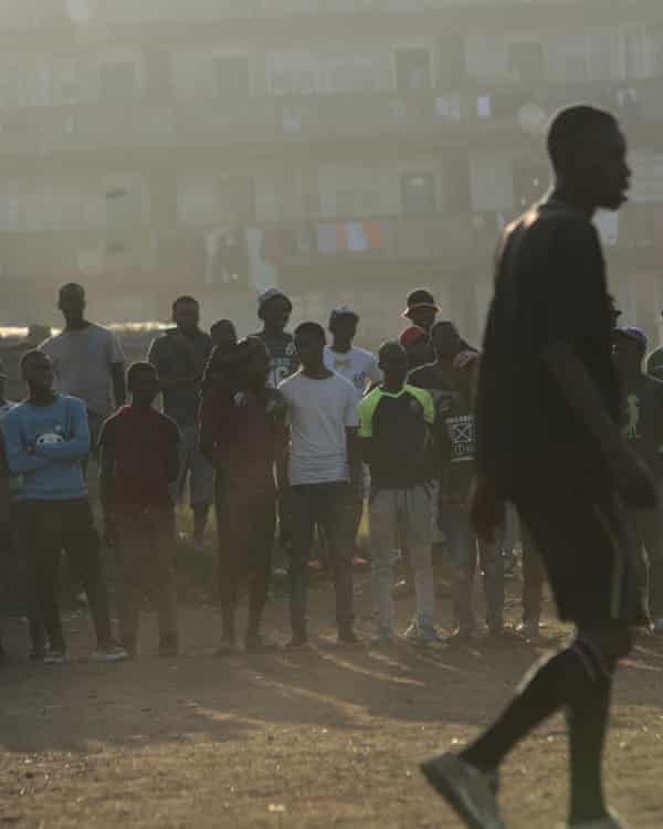 A crowd watches a match in Harare.