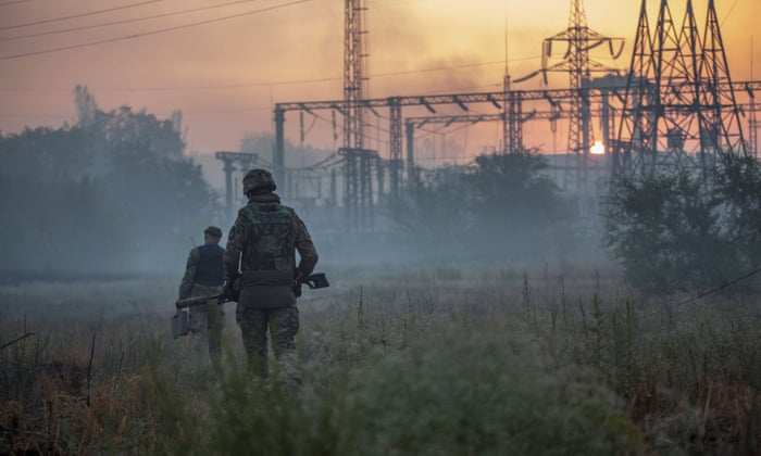 Ukrainian service members patrol an area in the city of Sievierodonetsk, as Russia’s attack on Ukraine continues, Ukraine June 20, 2022.