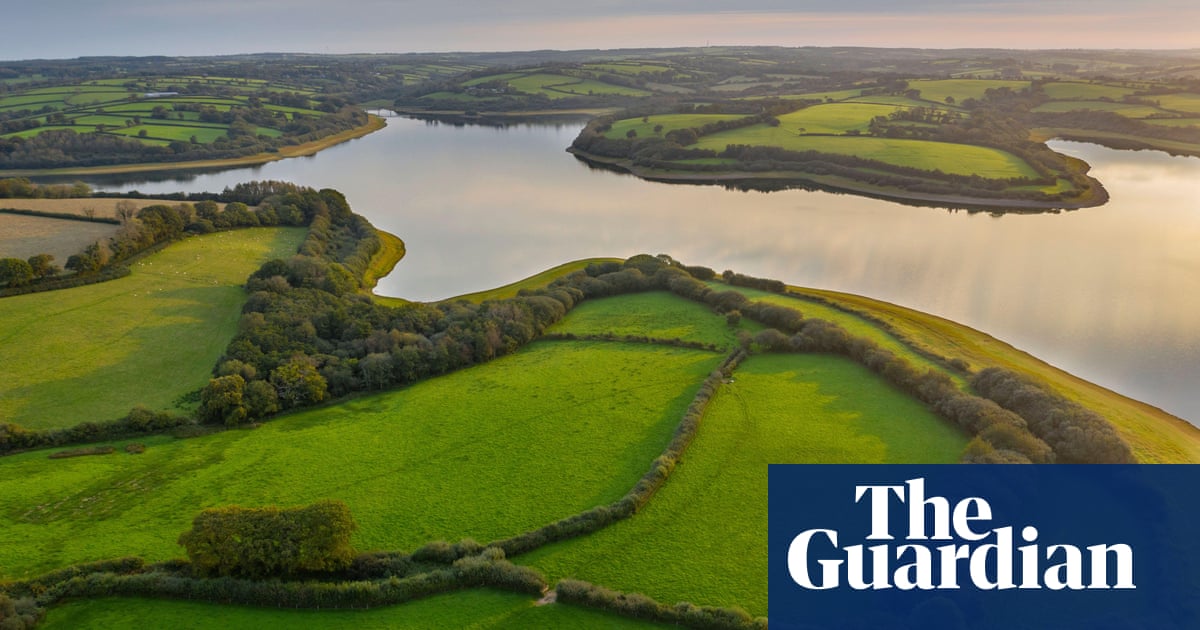 Police investigate death of two people after boat capsized on Devon lake