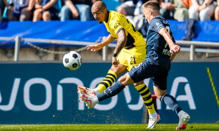European roundup: Mbappé scores twice in PSG win, Milan thrash Torino | European club football 6 Dortmund’s Donyell Malen takes a shot on goal against VfL Bochum.