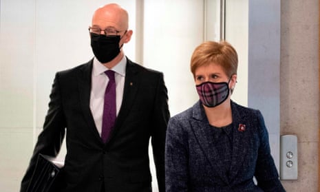 John Swinney and Nicola Sturgeon at the Scottish parliament on Thursday.