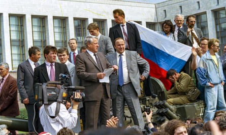 FILE - In this Monday, Aug. 19, 1991 file photo, Boris Yeltsin, president of the Russian Federation, makes a speech in front of the Russian parliament building in Moscow, Russia, 19 August 1991.