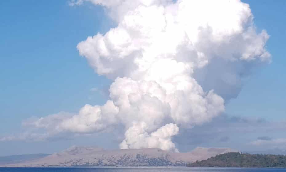 Taal Volcano spews white steam and ash as seen from Balete, Batangas province, south of Manila.