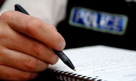 A police officer writing