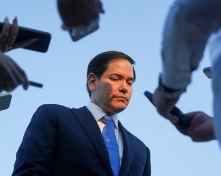 Marco Rubio surrounded by journalists