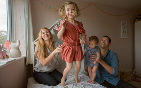 Sarah Tomczak, her husband, Jaron, Coco, three, and Sylvia (nine months) at home.