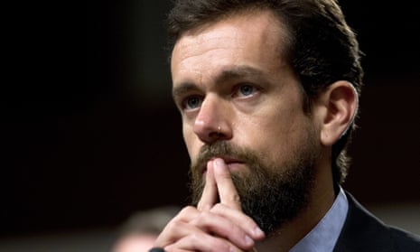 A bearded Jack Dorsey looking thoughtful
