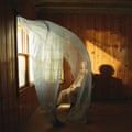 The artwork for Ride Lonesome depicts Beck in a wood-panelled room, partially obscured by a translucent linen curtain blowing from the window