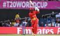 Canada’s Aaron Johnson belts the first ball of the T20 World Cup to the boundary