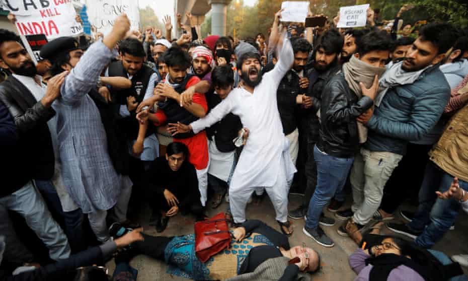 Protestors shout slogans during a protest against the citizenship bill in New Delhi.