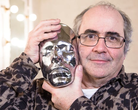 Danny Baker holding holding up a chromium mask of David Bowie’s face.
Programme Name: The People's History of Pop - TX: n/a - Episode: Danny Baker (No. 2) - Picture Shows: Presenter Danny Baker - (C) 7 Wonder - Photographer: unknown