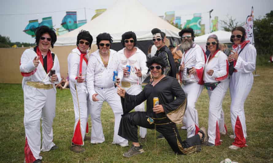 Festivalgoers dressed as Elvis Presley.