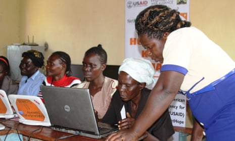 Mary Namukholi, right, conducts an evening class at a local ICT hub located in Nambalayi primary schoo, Kenya