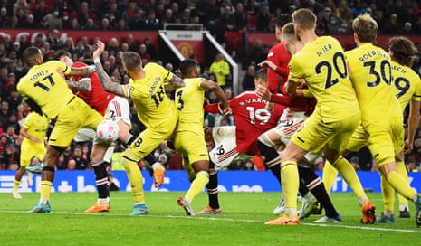 Raphael Varane (no.19) fires home Manchester United’s third goal.