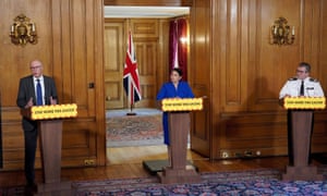Left to right: NHS England medical director Prof Stephen Powis, home secretary Priti Patel and chairman of the National Police Chiefs’ Council Martin Hewitt.