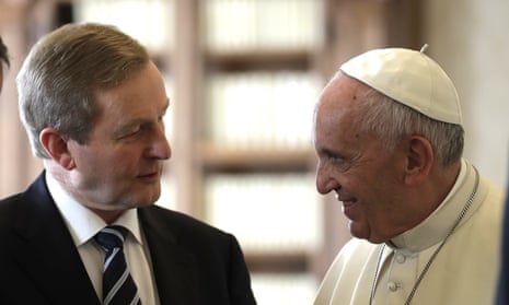 Pope Francis exchanges gifts with the Irish prime minister, Enda Kenny, during a private audience at the Vatican.