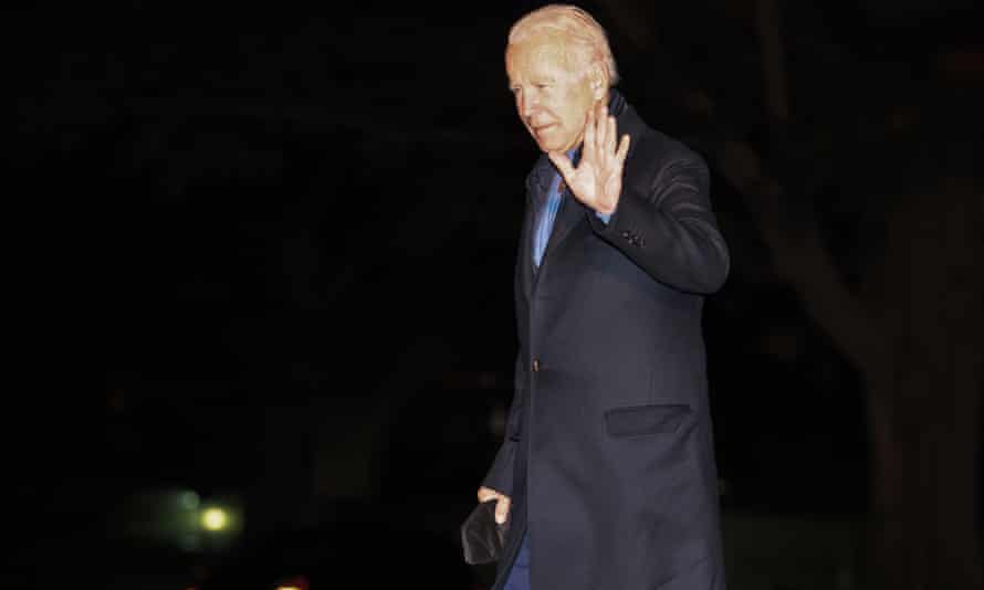 Joe Biden walks from Marine One after arriving on the South Lawn of the White House early on Wednesday.