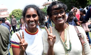 V for victory at the Supreme court premises in New Delhi