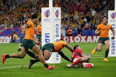Wales' Nick Tompkins scores a try.