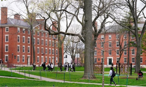 Students walk through Harvard Yard in April 2022. 