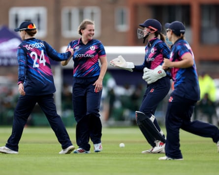 The Scotland cricketers Kirstie Gordon, Kathryn Bryce the captain, and Ailsa Lister the wicket-keeper celebrate a wicket during their team’s Women’s T20 World Cup warm-up game against Pakistan in Derby.