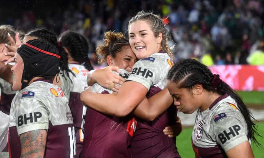 Queensland players celebrate victory after a State of Origin match at the Sunshine Coast Stadium