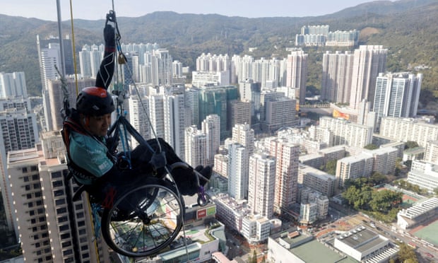 Lai Chi-wai on his attempt to climb the 320-metre tall Nina Tower.