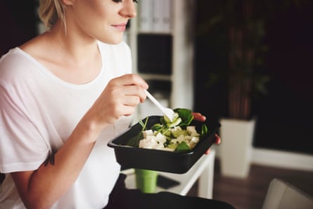 Woman eating a salad