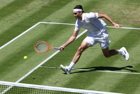 Taylor Fritz pops the ball over the net during his second round victory over Patrick Kypson.
