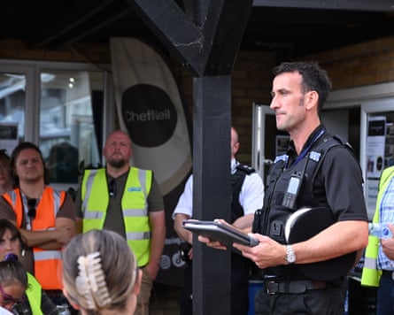 Supt Tom Pearse speaks to volunteers at Brantham leisure centre.