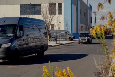 Monitoring Amazon: the New Yorkers monitoring air pollution from supply hubs | Amazon 5 Amazon trucks leave a delivery center via Beard Street in Red Hook.