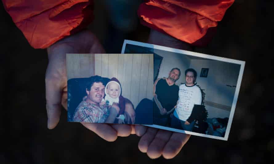 Steve Ellis holds photos of his father and himself near his home in Bridgewater, Nova Scotia.