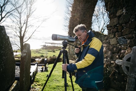 Declan Coney, a former fisher, monitors birds on Lough Neagh from the monastery at the Cross of Ardboe. He feeds back the data to the British Trust for Ornithology.