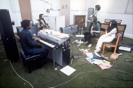 Yoko Ono watches as the Beatles jam with Billy Preston on keyboard